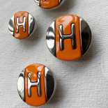 Bouton Design Orange et Argent Lettre H 23-27mm