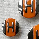 Bouton Design Orange et Argent Lettre H 23-27mm